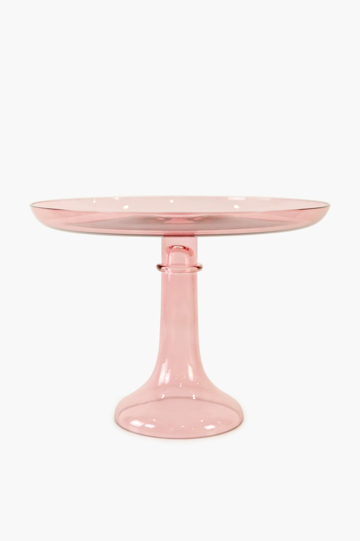 The Estelle Colored Glass pink cake stand features a wide, flat top and sturdy flared base, highlighting the elegance of luxury hand-blown colored glassware.