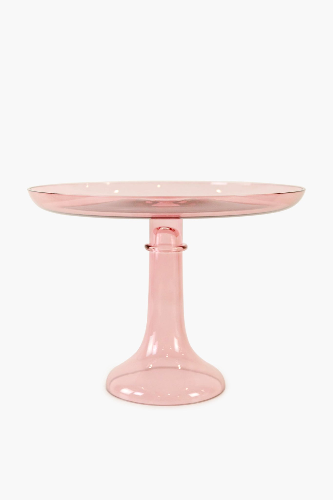 The Estelle Colored Glass pink cake stand features a wide, flat top and sturdy flared base, highlighting the elegance of luxury hand-blown colored glassware.
