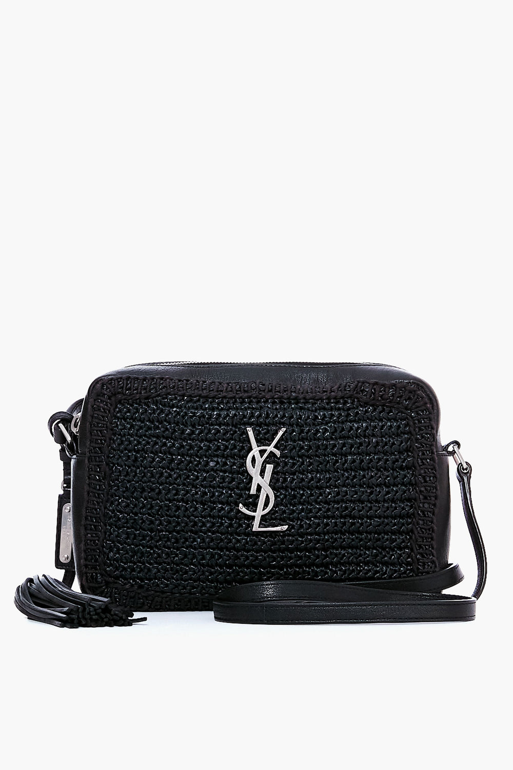 A small black raffia camera bag with leather accents and a silver logo on the front, featuring a matching strap and tassel. Discover this elegant pre-owned luxury bag from the Tuckernuck Archive Collection.