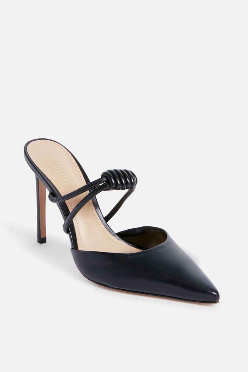 A black pointed-toe stiletto mule with two thin straps, one featuring a coiled design, and a high heel from Schutz's Black Lela Casual Heels collection.
