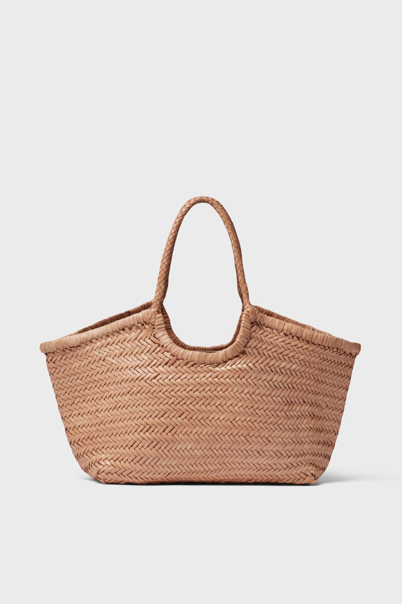 The image shows a Dragon Diffusion woven straw tote bag with two handles, showcasing the charm of handwoven tote designs.