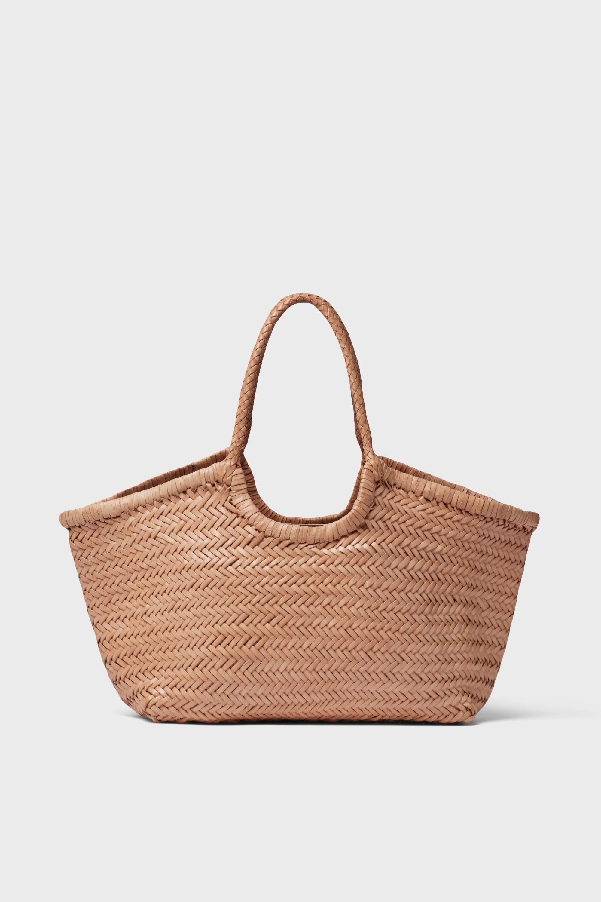 The image shows a Dragon Diffusion woven straw tote bag with two handles, showcasing the charm of handwoven tote designs.
