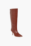 Loeffler Randall brown knee-high boots featuring a pointed toe, slim heel, and lizard-embossed leather finish.