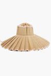 Lorna Murray travel-friendly wide-brimmed sun hat features pleated straw, light-colored trim, a unique structured design, and UPF 50+ sun protection.