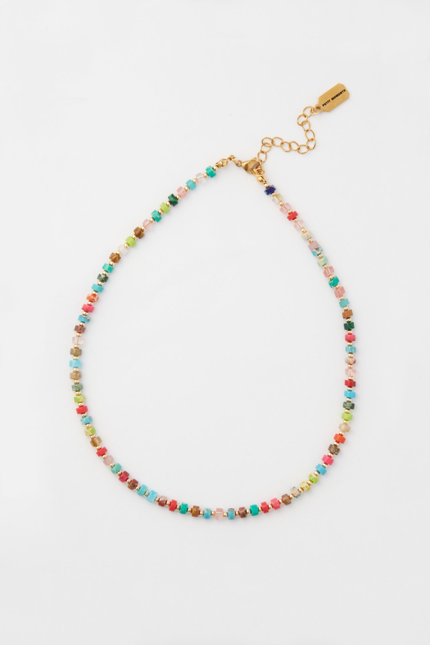 The Petit Moments multicolor beaded necklace features cube-shaped beads and a gold adjustable clasp, perfect for layering.