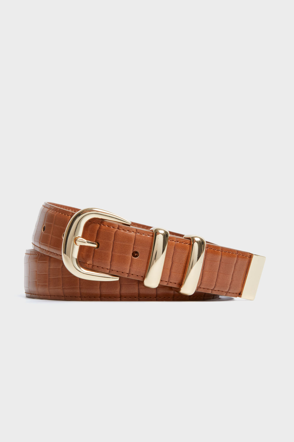 The Tuckernuck Accessories brown croc-embossed western belt features a gold-tone buckle, two gold loops, and an adjustable waist design.