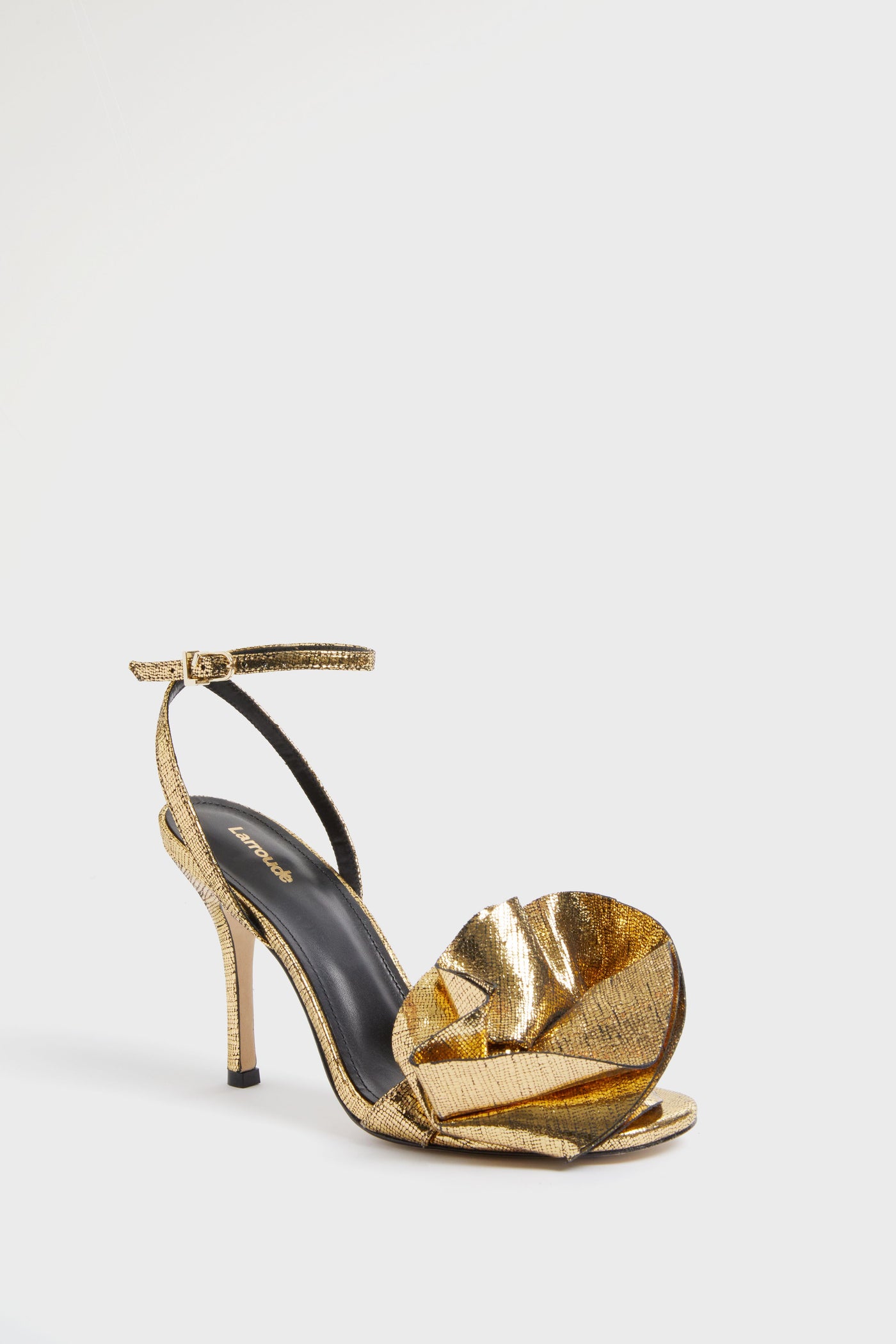 Larroude Gold Metallic Leather Sandals feature stiletto heels, an ankle strap, black insole, and a bold gold accent on the front—making them perfect party shoes for any glamorous occasion.
