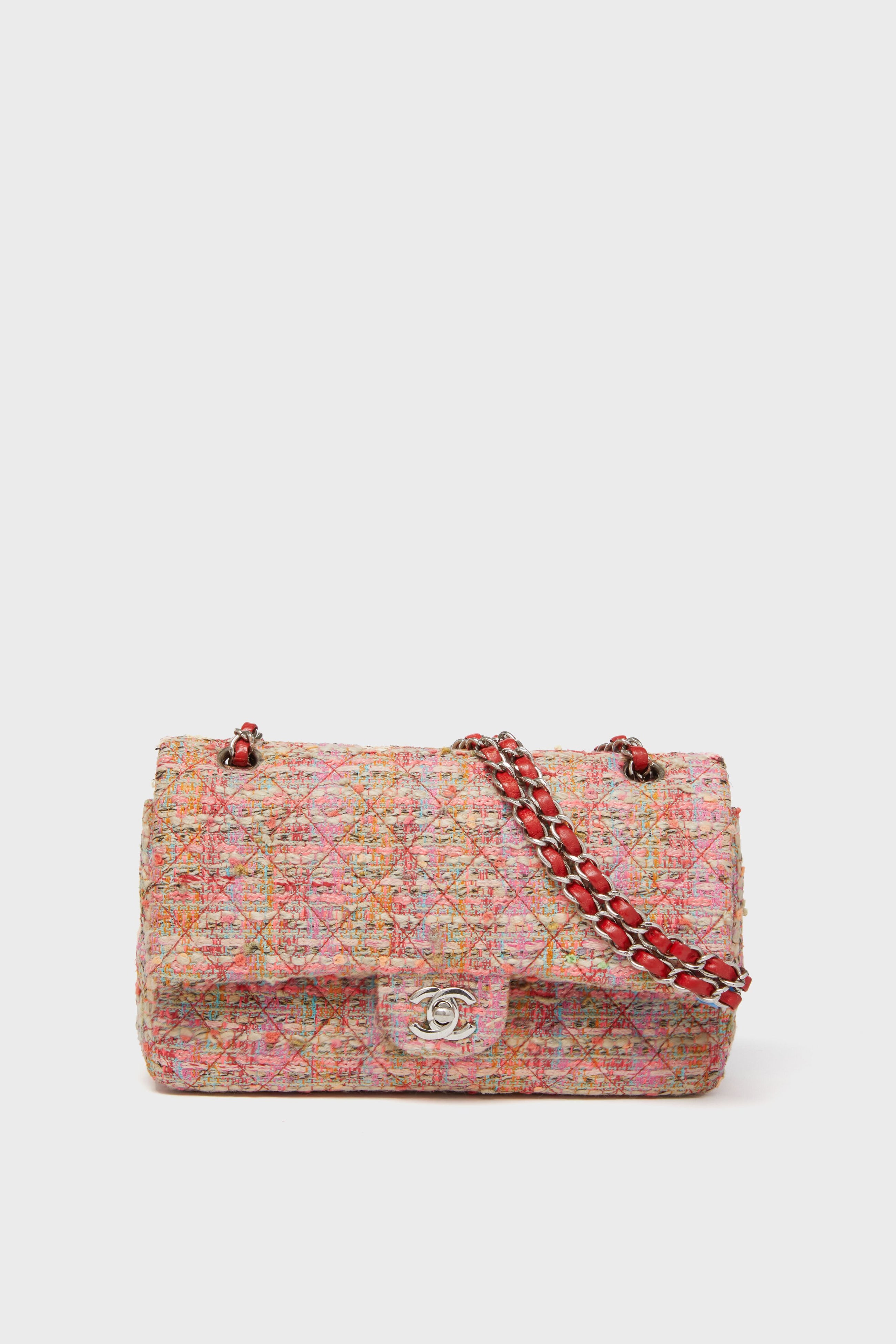 The Tuckernuck Archive Collection pink quilted handbag, inspired by the Chanel Classic Flap Bag, features a silver clasp and a chain strap interwoven with pink leather—an embodiment of timeless elegance.