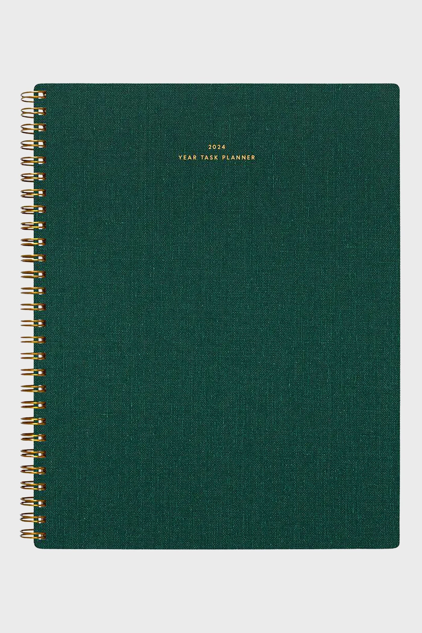 A 2024 yearly task planner from APPOINTED in hunter green with gold lettering on the cover and stylish spiral binding.