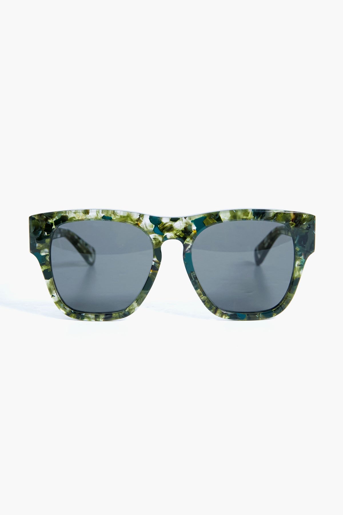 A pair of Chloe oversized square sunglasses with dark lenses and green marbled recycled acetate frames.