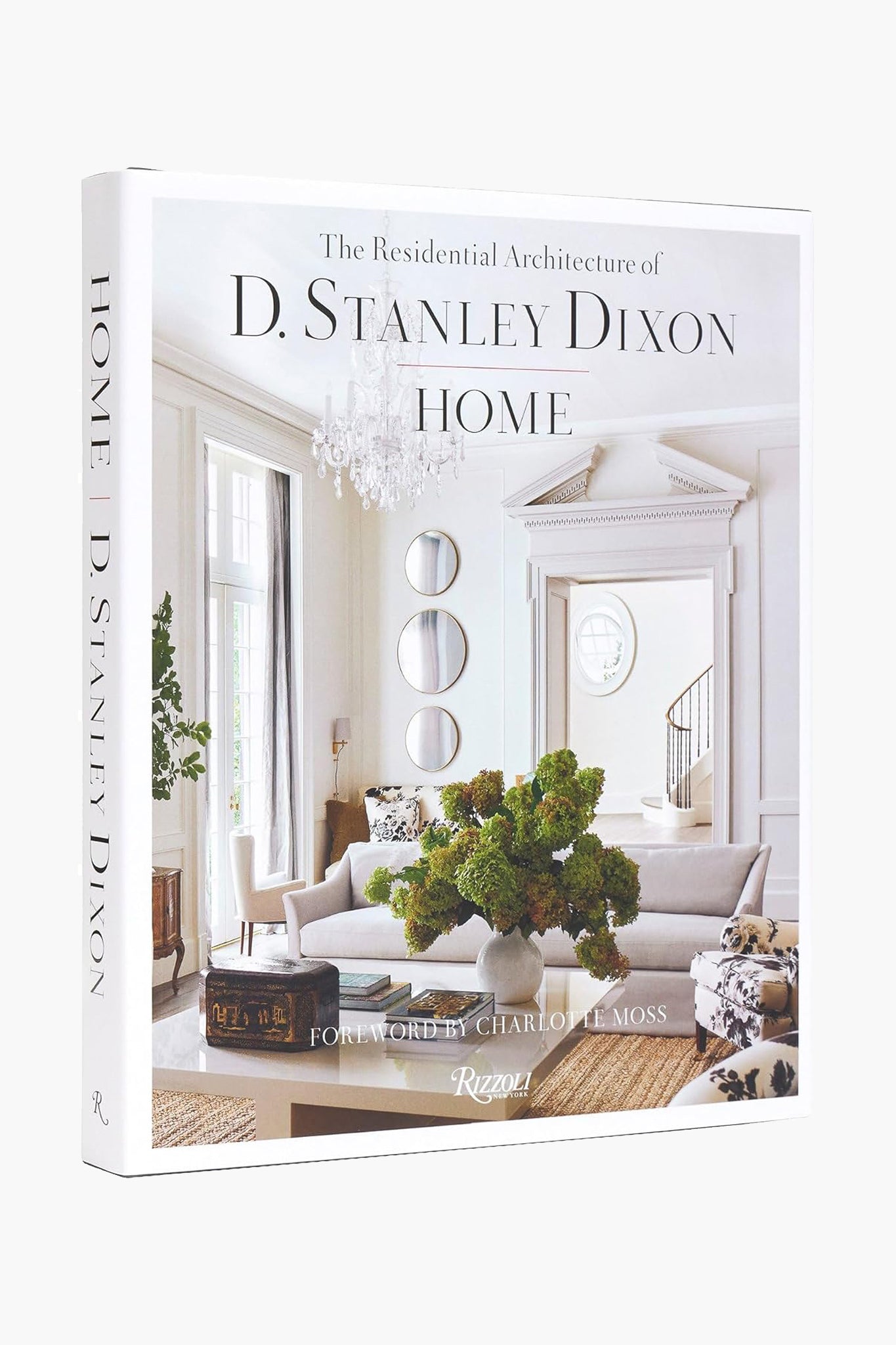 Rizzoli's book, Home: The Residential Architecture of Stan Dixon, features a cover with an elegant, light-filled living room decorated in classic style and green florals, blending classical architecture with modern design.