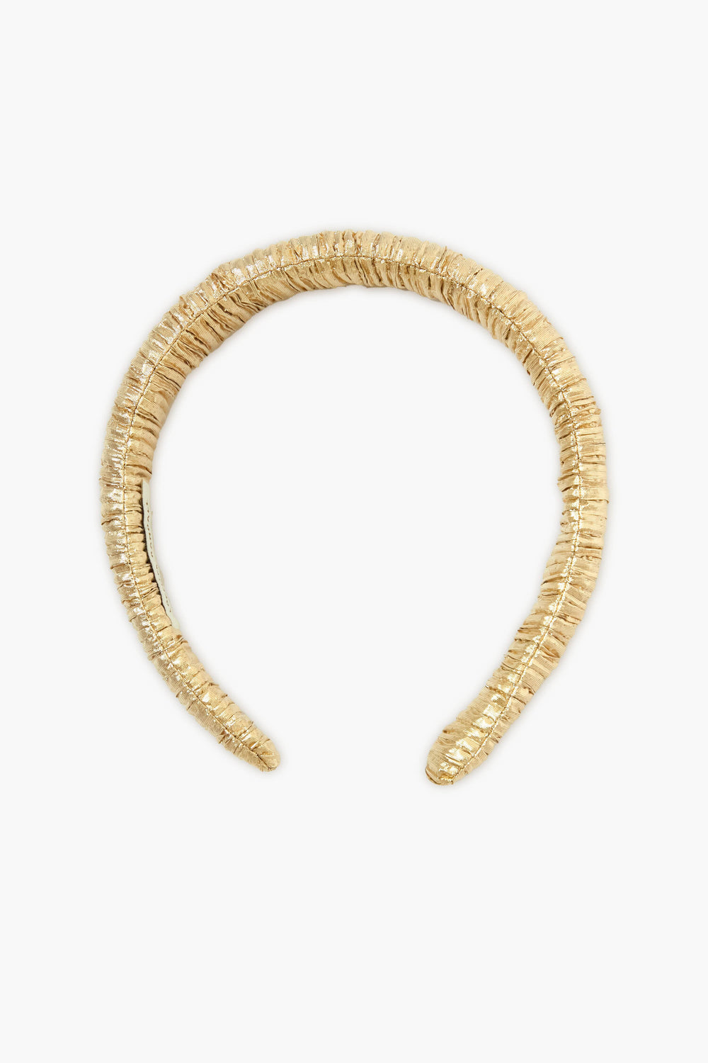 The Loeffler Randall puffy gold lamé headband features a ruched, metallic fabric that adds shine to any look.