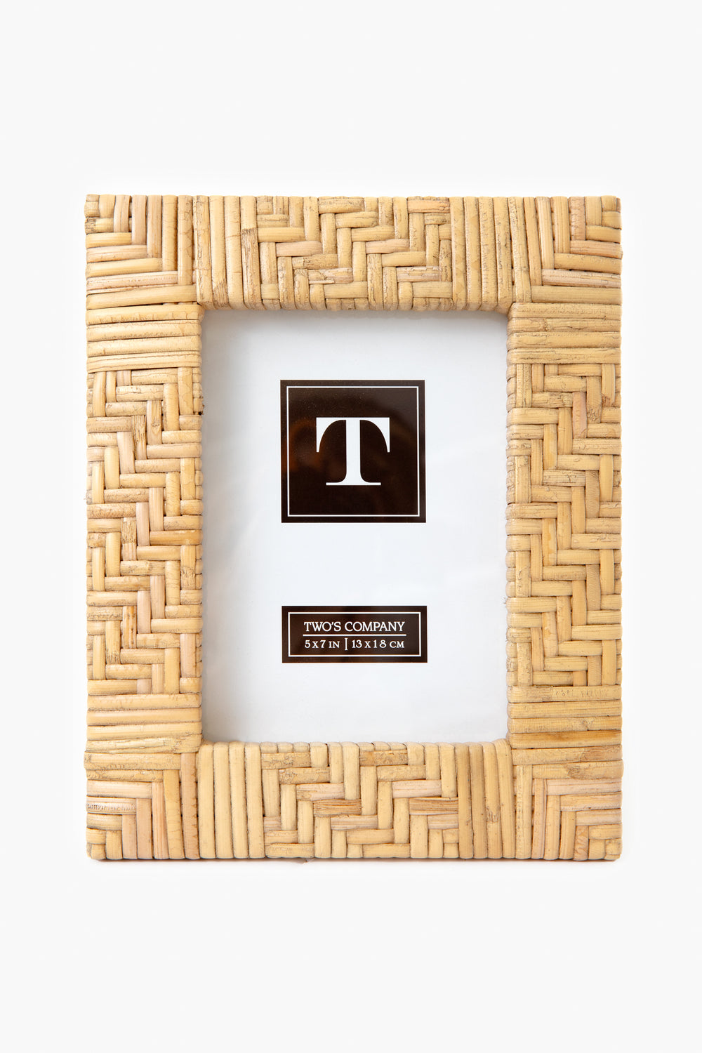 The Two's Company Rectangular Woven Rattan Picture Frame features a bamboo pattern and a placeholder insert with the letter T and size. Perfect for boho home décor or as an ideal housewarming gift.