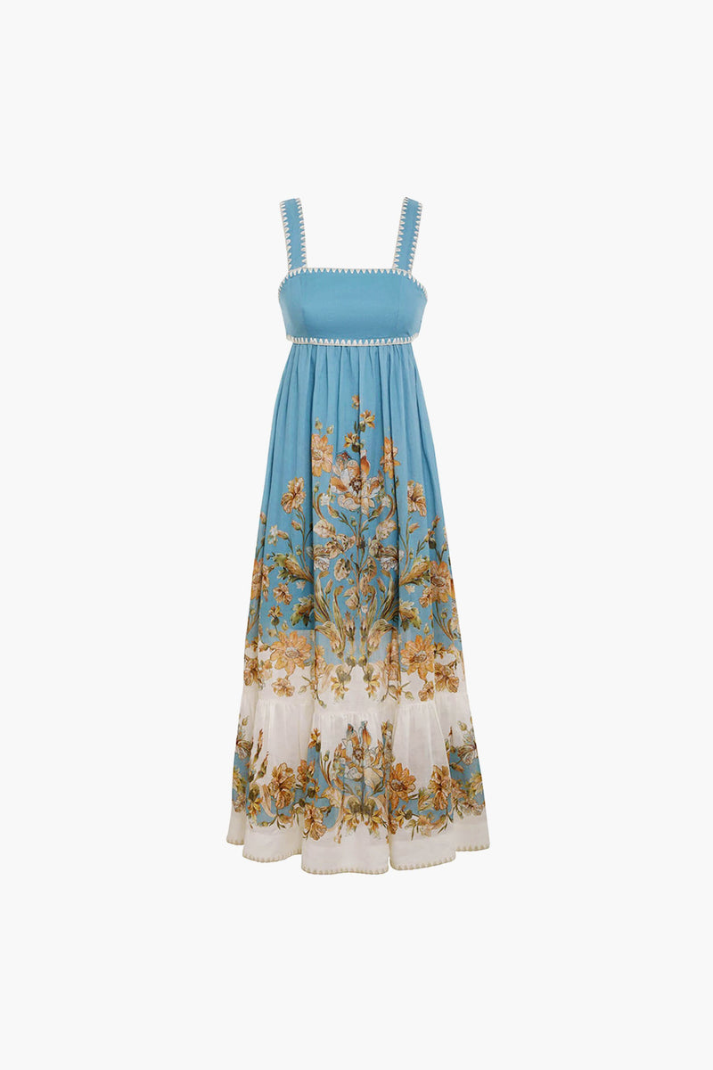 Zimmermann sleeveless blue Daisy Chintz tiered dress features white lace trim and a floral skirt print, creating a breezy boho-chic look.