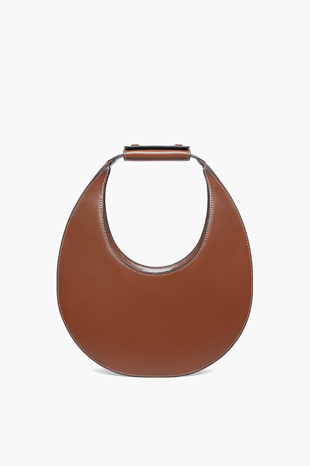 STAUD's Tan Moon Tote is a brown, crescent-shaped leather shoulder bag with a short, wide top handle.