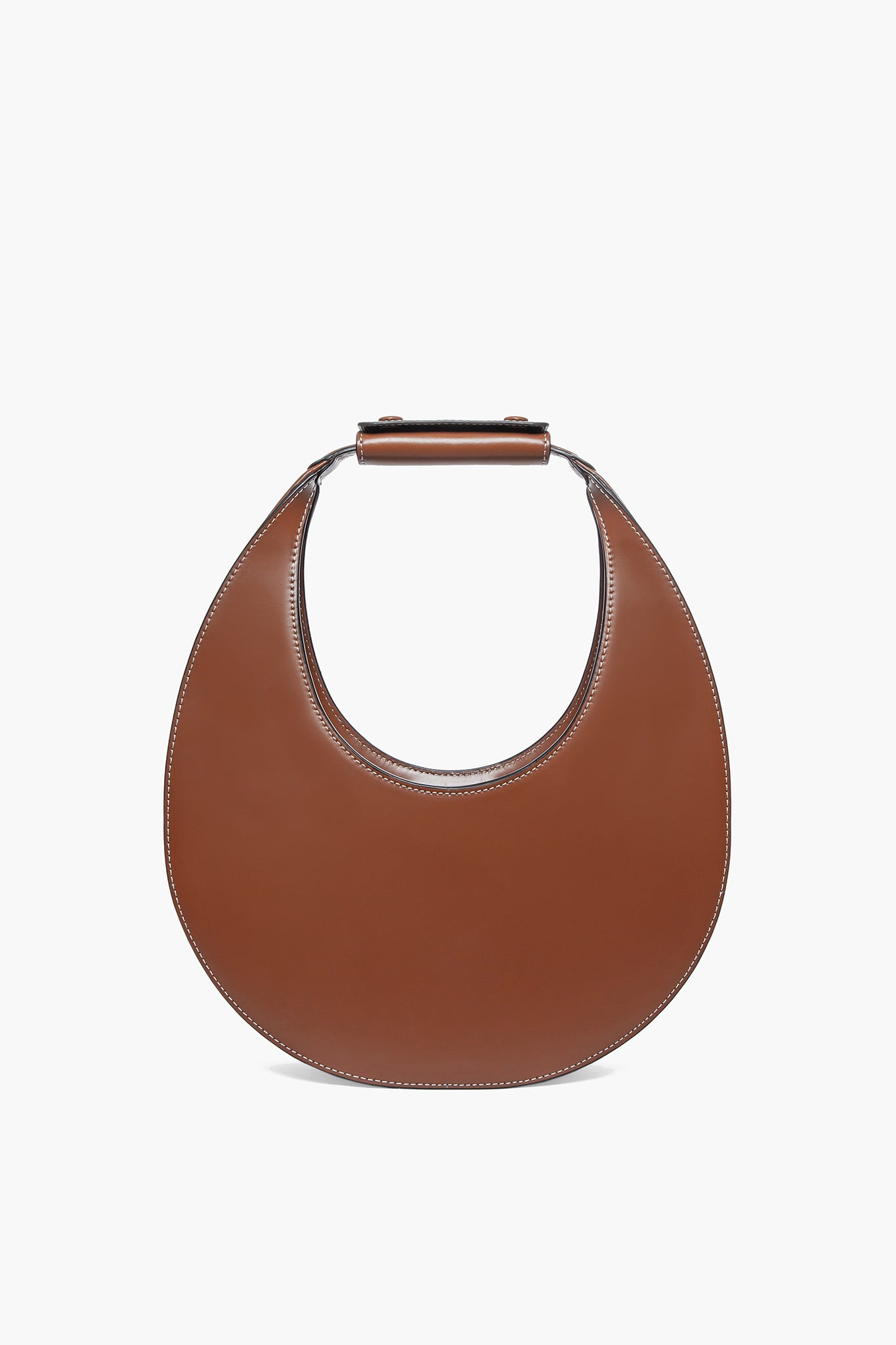 STAUD's Tan Moon Tote is a brown, crescent-shaped leather shoulder bag with a short, wide top handle.