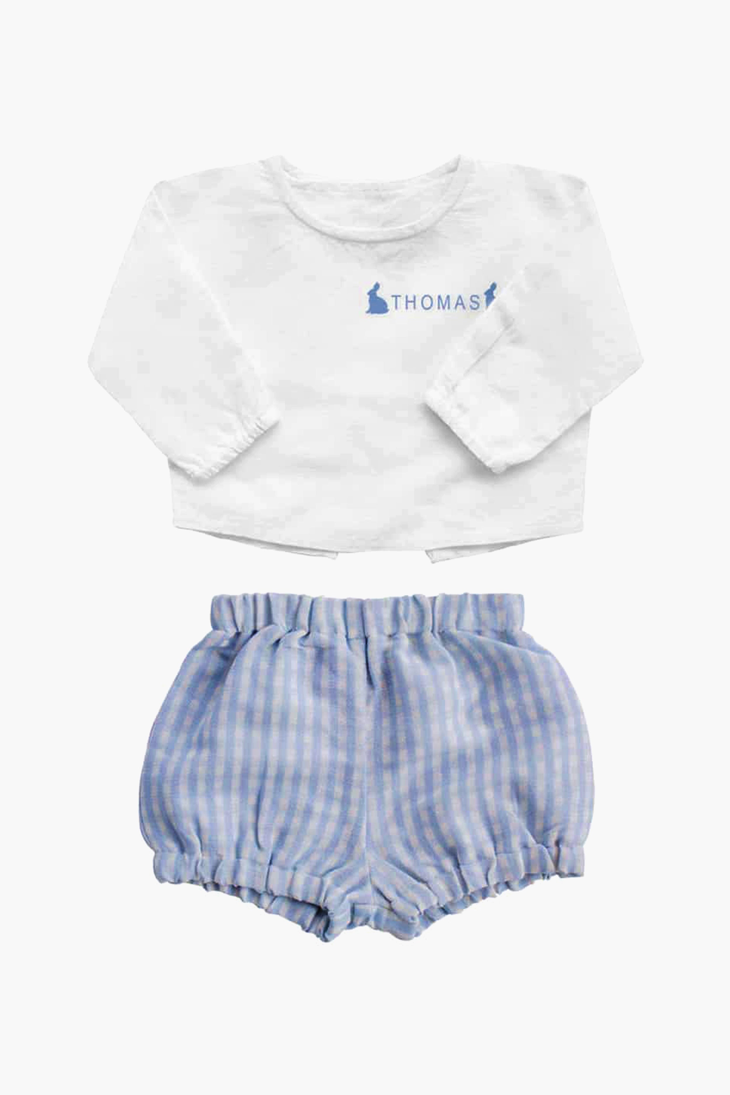 A delightful Louelle. baby gift: a boys’ set with a white long-sleeve top featuring "Thomas" and blue bunny prints, paired with classic blue and white gingham shorts.