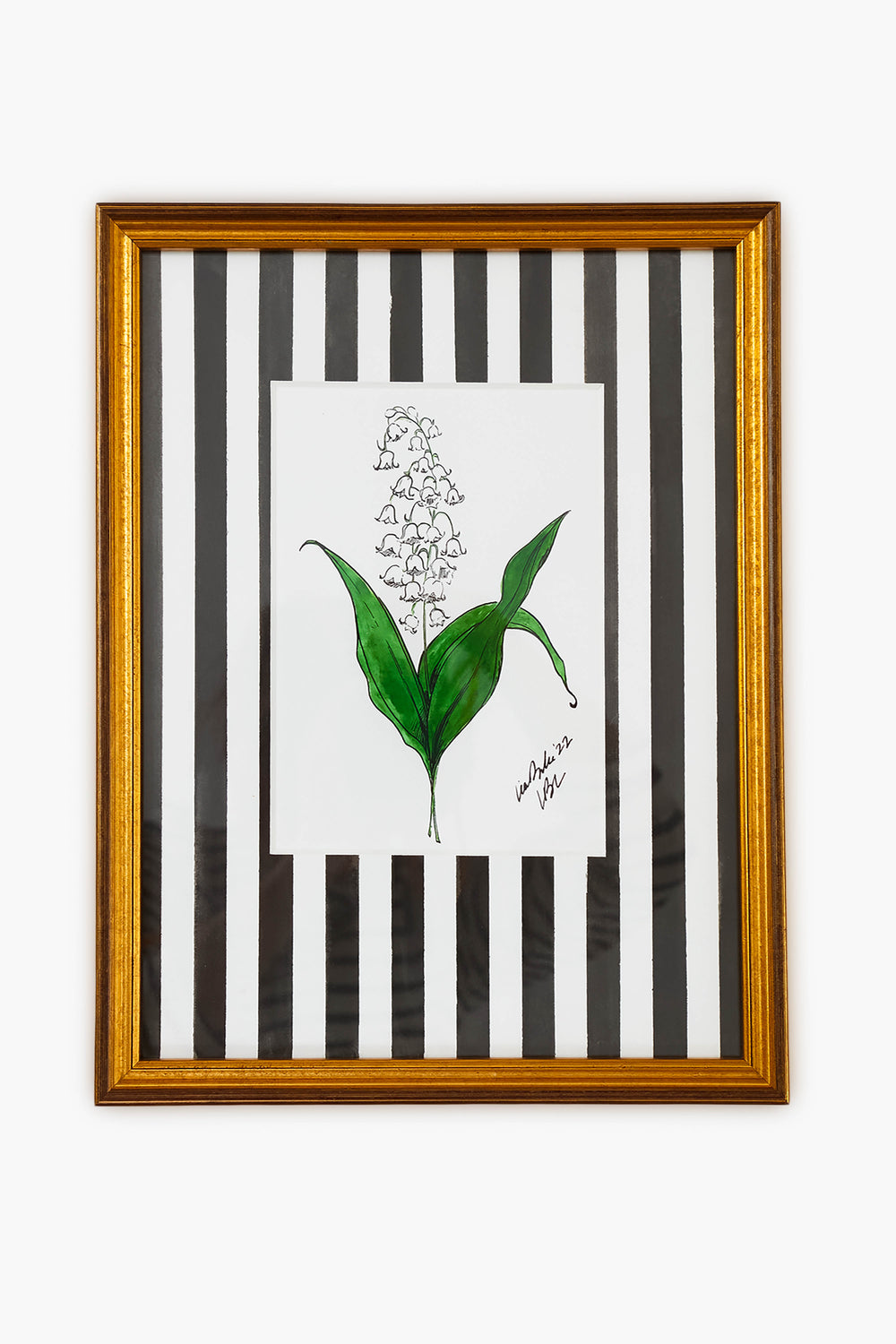 A Lia Burke Libaire framed artwork featuring Lily of the Valley blooms set against black and white vertical stripes.