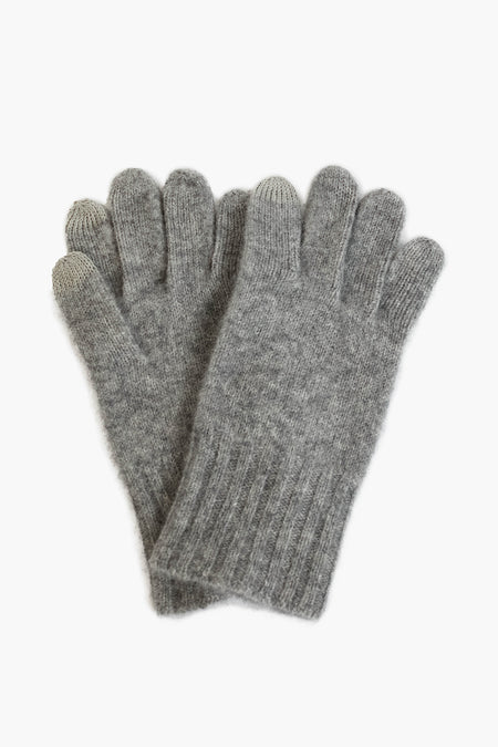 A pair of grey Amicale cashmere gloves with ribbed cuffs, arranged overlapping for a cozy, luxurious knitwear look.