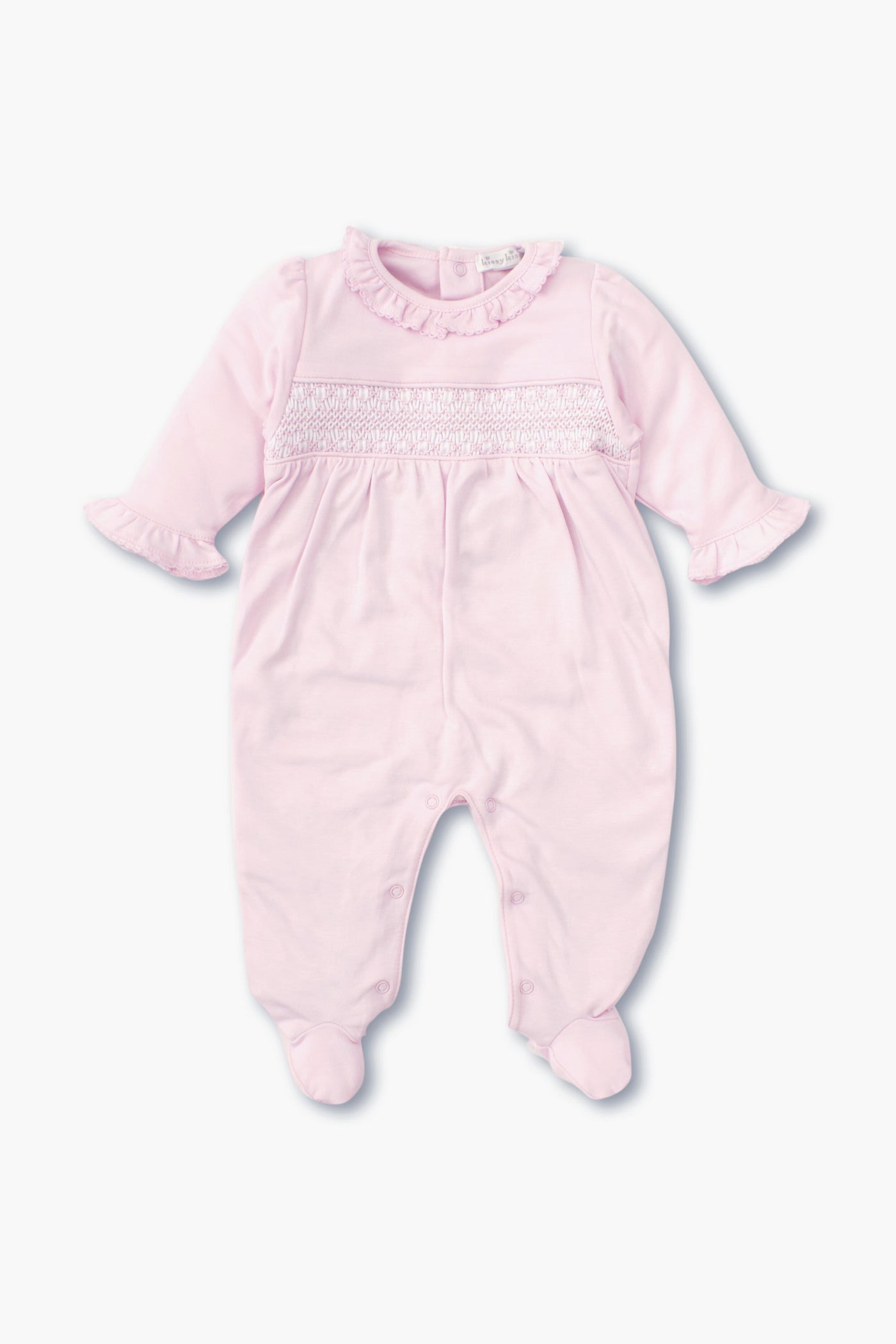 The kissy kissy light pink long-sleeve hand-smocked footie baby onesie is made from soft Peruvian cotton and features a ruffled collar, ruffled cuffs, smocked chest detail, and closed feet.