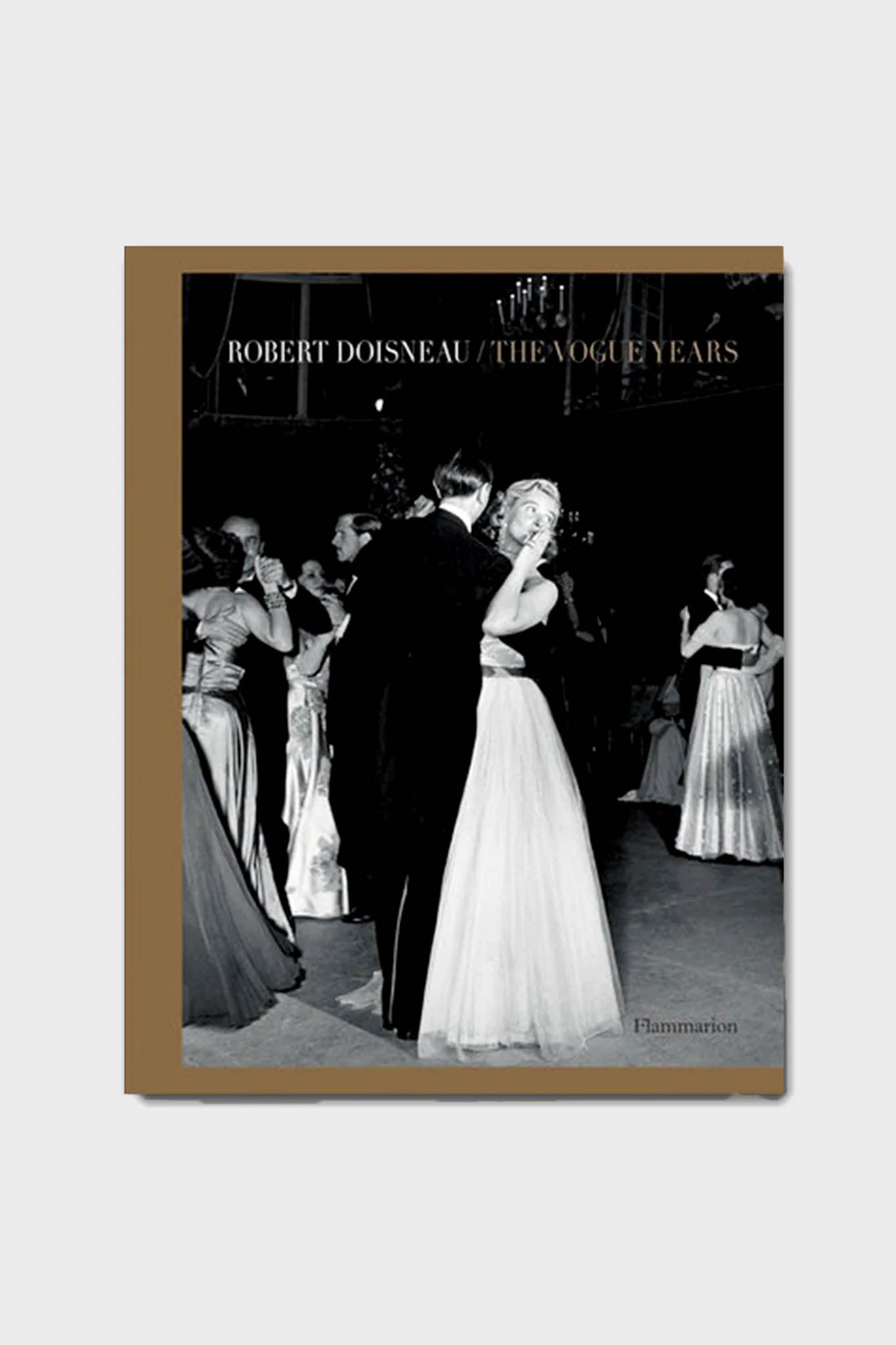 A black and white ballroom dance photo graces the cover of Flammarion’s "Robert Doisneau / The Vogue Years," celebrating his iconic photography for Vogue Paris.