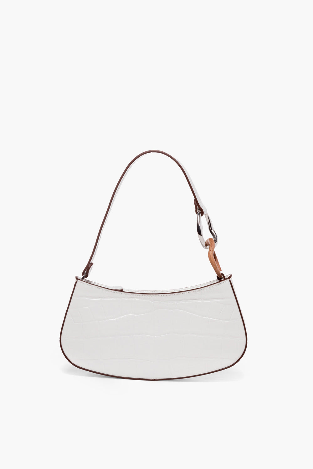 A white, crescent-shaped STAUD Ollie shoulder bag crafted from croc-effect leather with a textured surface and a single shoulder strap.