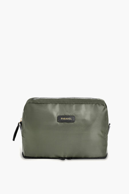 Paravel olive green rectangular toiletry bag featuring a black zipper and front label, ideal as a lightweight travel cosmetic pouch.