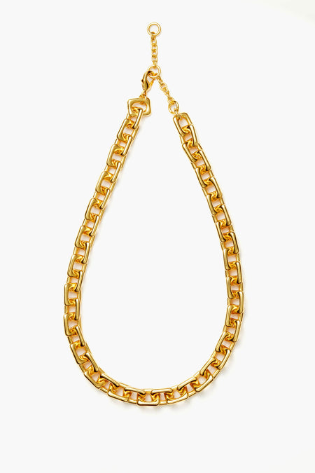 The Tuckernuck Jewelry chunky gold rectangle chain necklace features large, rectangular links and a lobster clasp. This adjustable piece makes a bold statement with any outfit.