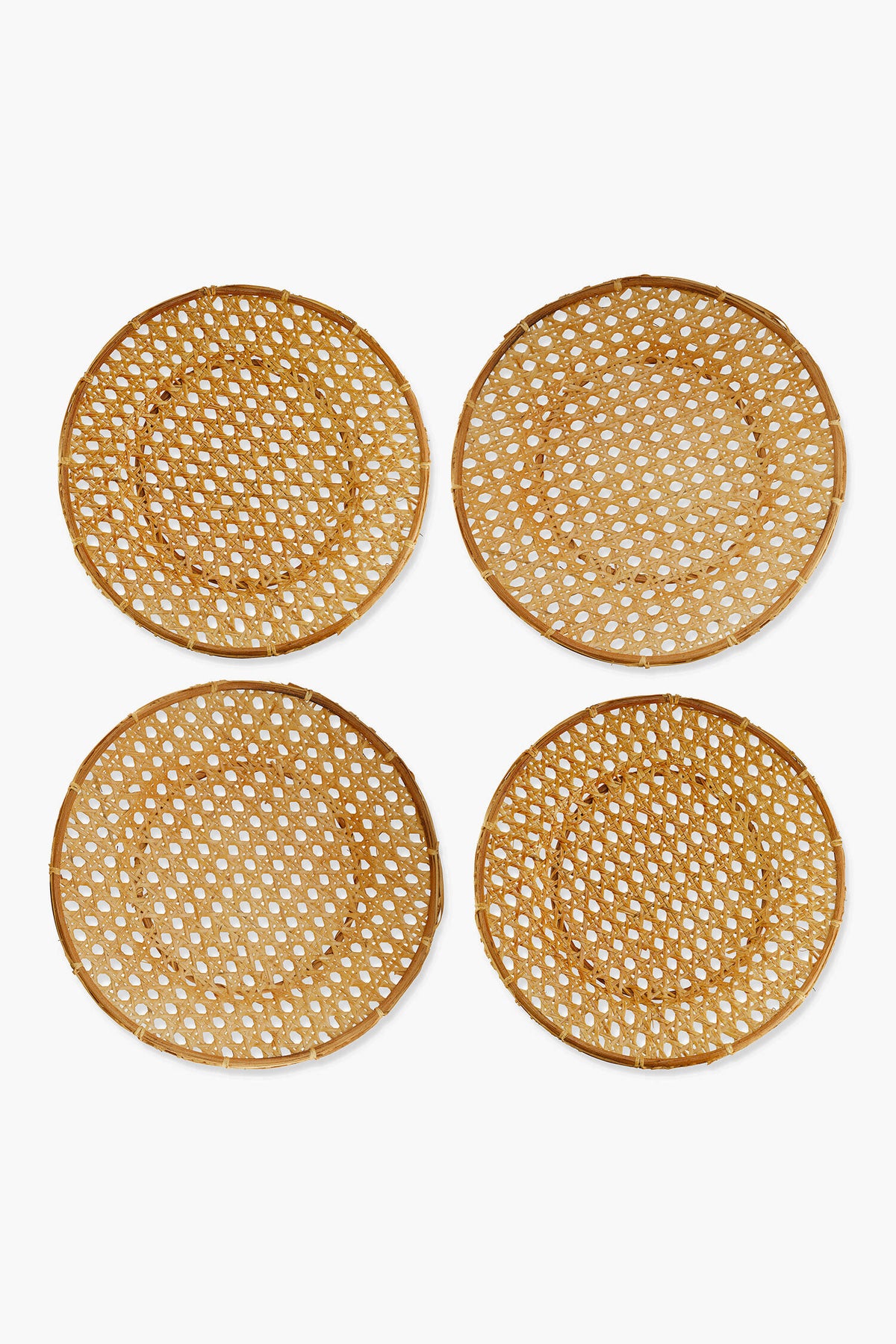 Chefanie’s set of four round woven rattan coasters with a lattice pattern creates stylish table decor and pairs beautifully with woven placemats or Cane Chargers.