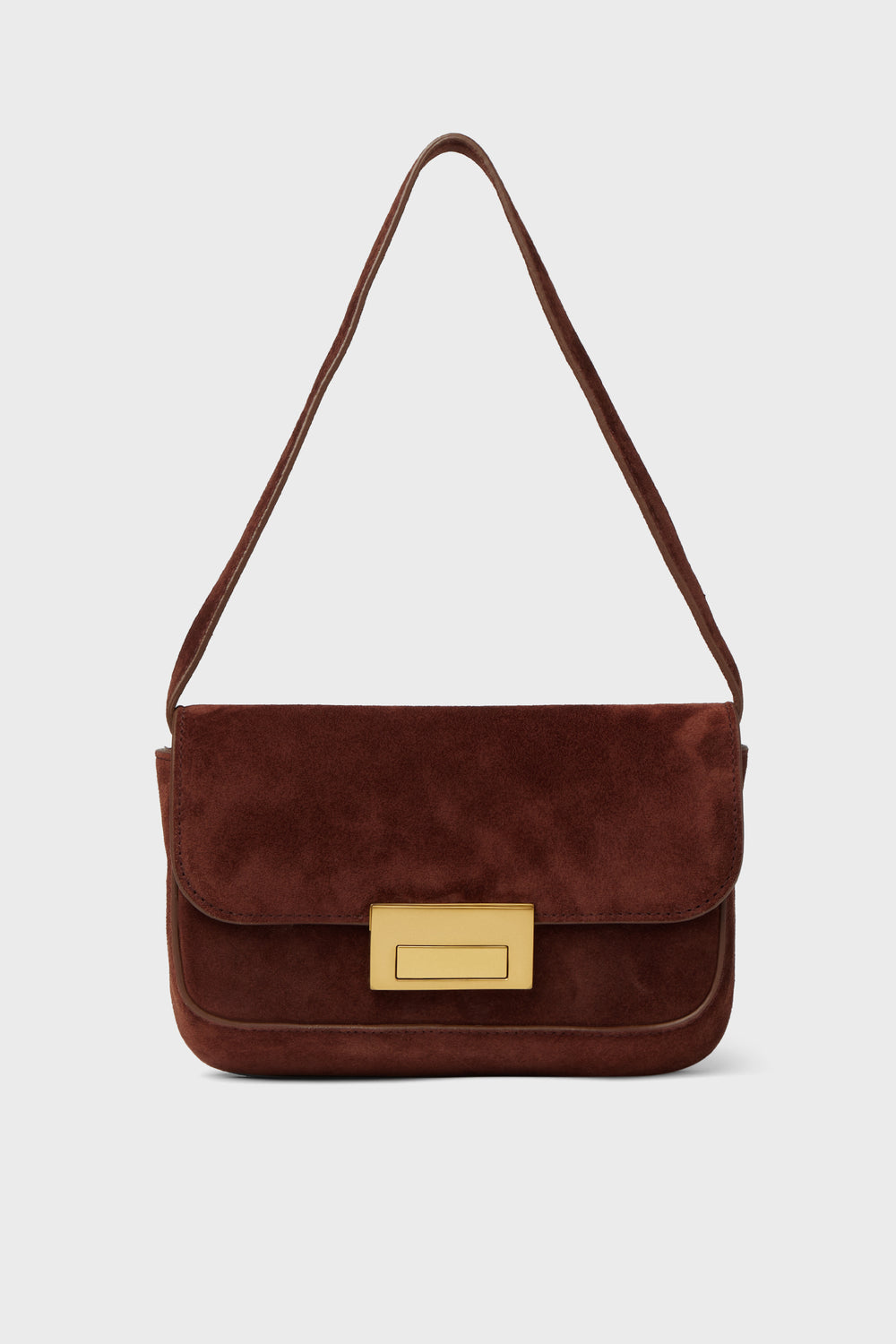 A brown suede baguette bag by Loeffler Randall, featuring a rectangular gold clasp and a single strap.