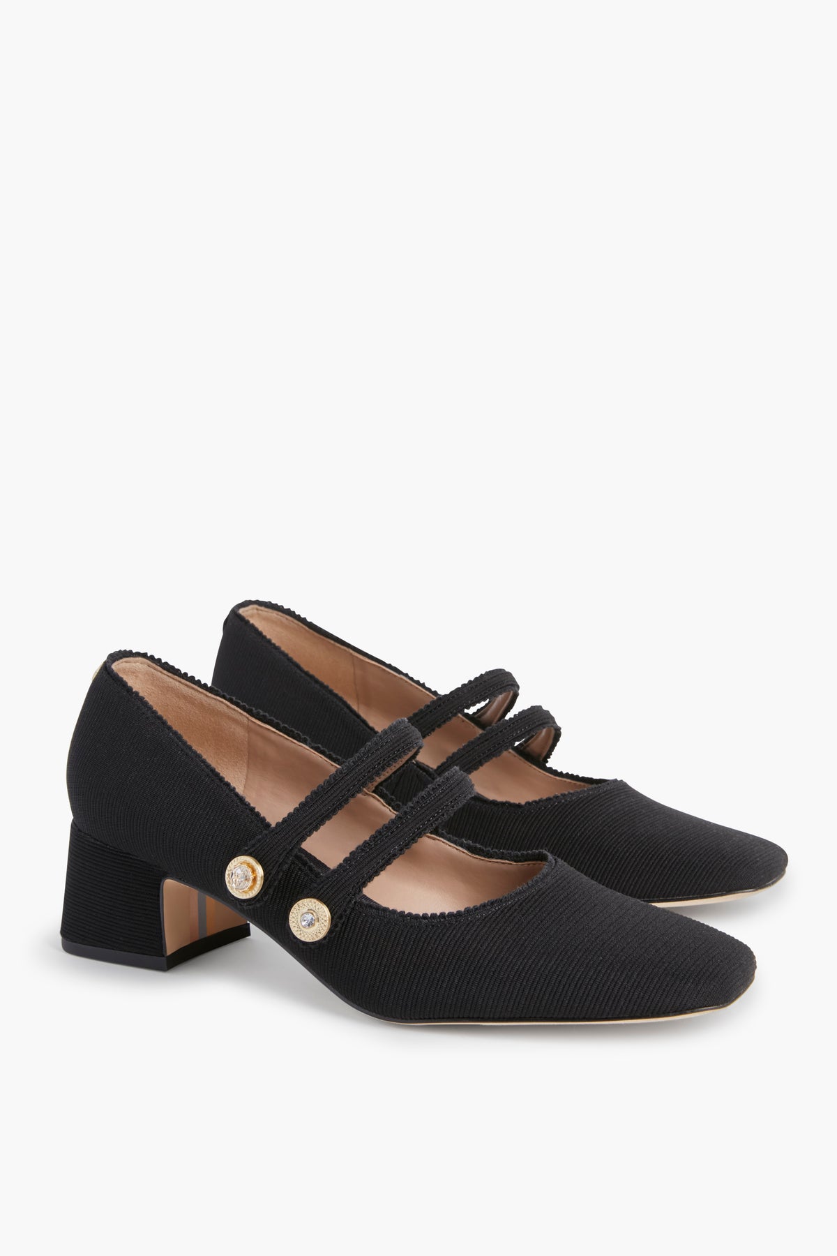 A pair of Sam Edelman Black Tahira Heels Mary Janes featuring two straps, gold button details, and low block heels.