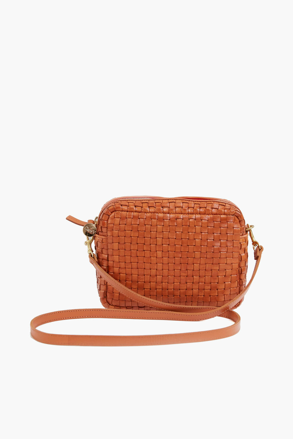 This handcrafted Clare V Midi Sac is a small rectangular woven leather crossbody bag in orange with a matching long leather strap.