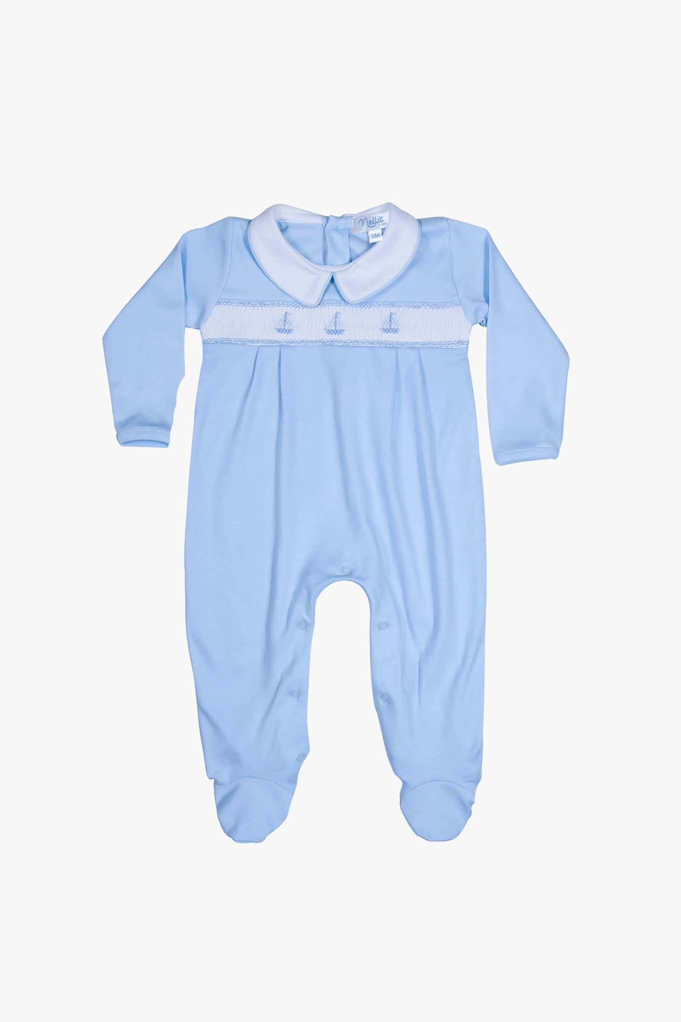 Nella Pima light blue long-sleeve footie pajamas, crafted from soft Peruvian Pima cotton with a white collar, footed legs, and chest stitching—ideal as a baby gift.