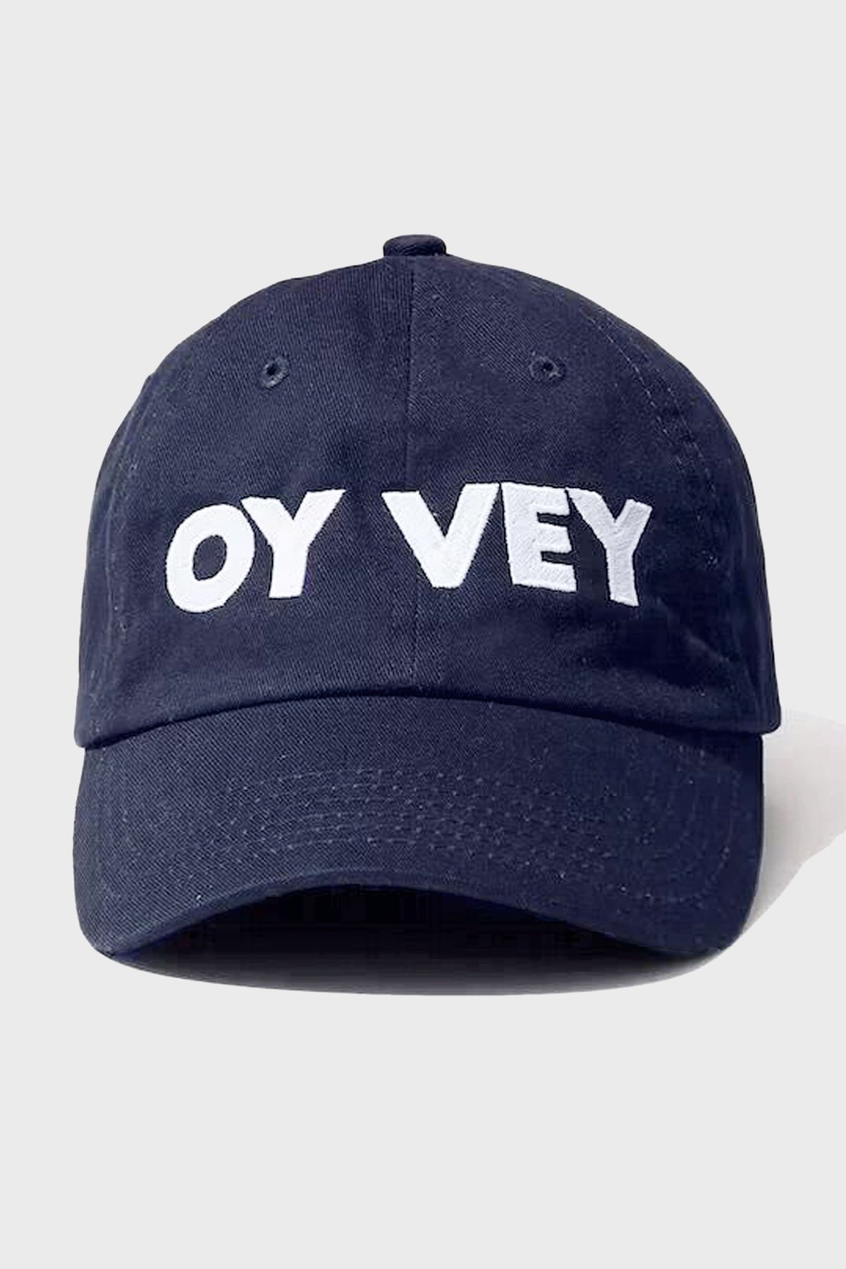 The KULE navy blue OY VEY cap features bold white lettering on the front, making it a perfect match for your favorite stripe tee.