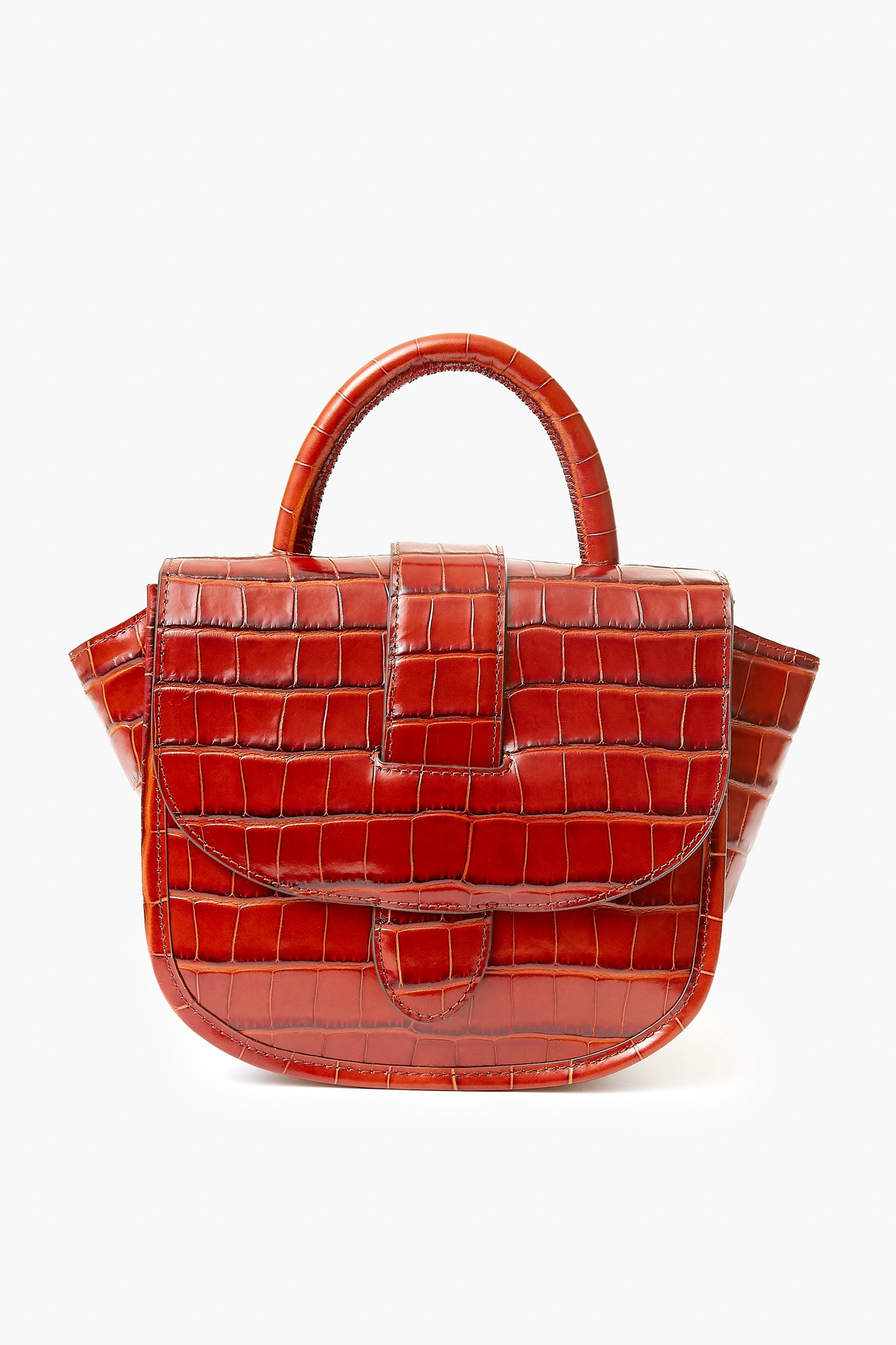 A compact Loeffler Randall bag crafted from glossy red croc-embossed leather features a top handle, front flap, and winged sides.