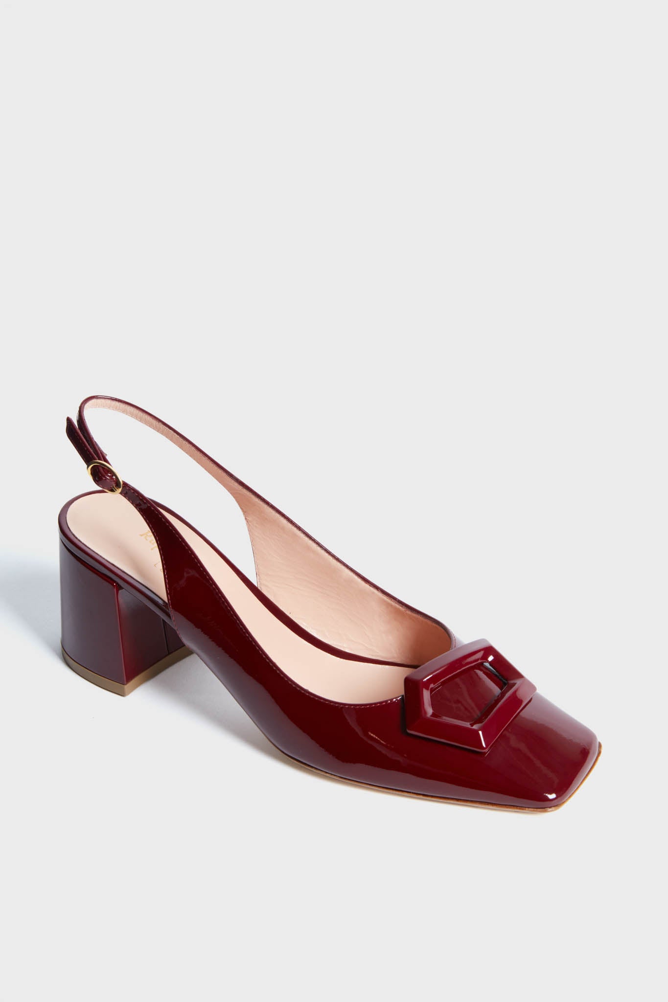 Rupert Sanderson Burgundy Patent Bordeaux Myola Heels in patent leather feature a block heel and a square buckle on the toe—expertly handmade in Italy for timeless elegance.