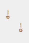 Tuckernuck Jewelry gold-plated drop earrings with round pendants, rainbow pave multicolored gemstones, and small clear stones on the hooks.