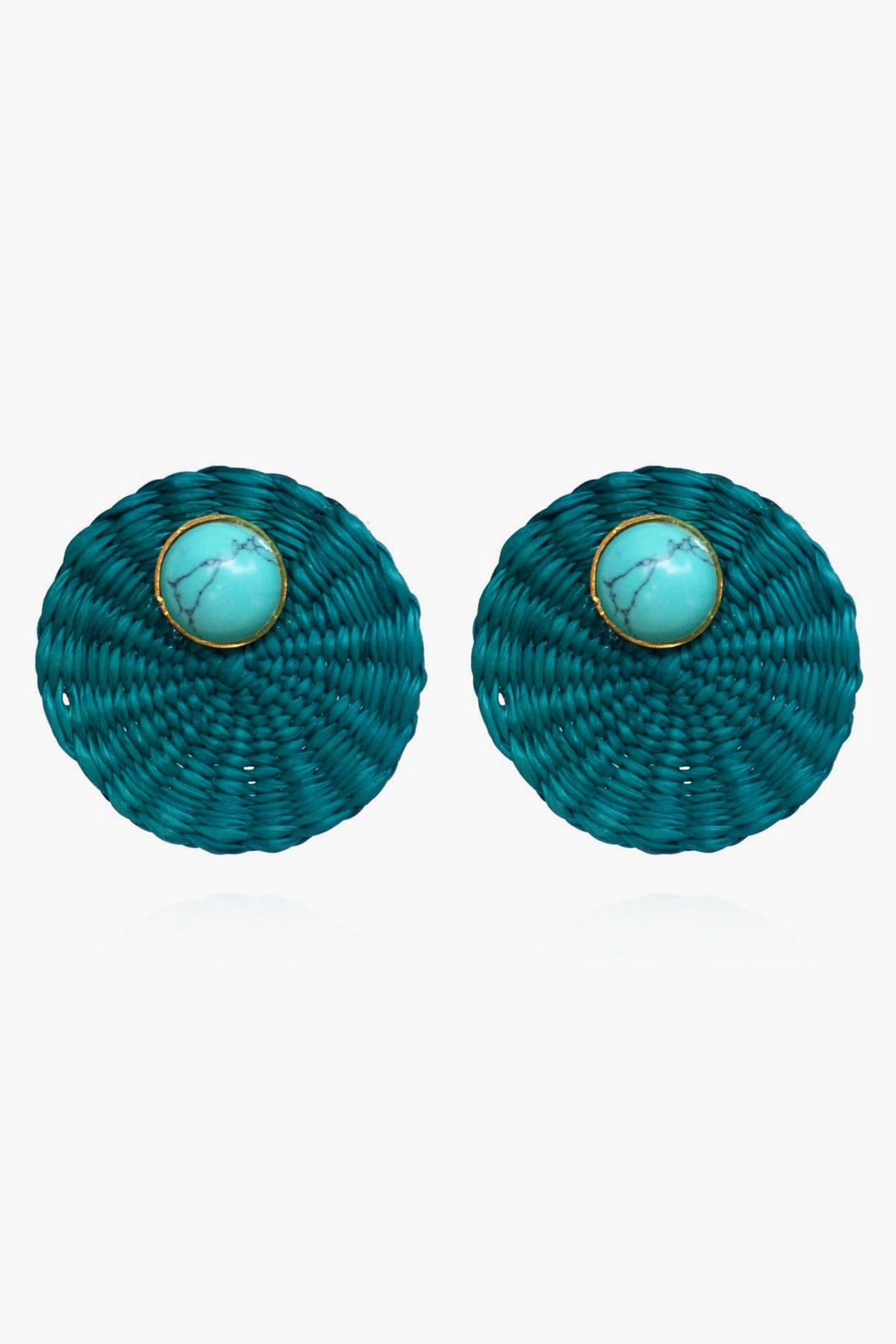 Ana Carolina Valencia round teal woven turquoise stud earrings feature a central turquoise stone framed by a thin gold-plated bronze rim—a stunning piece of handmade jewelry.