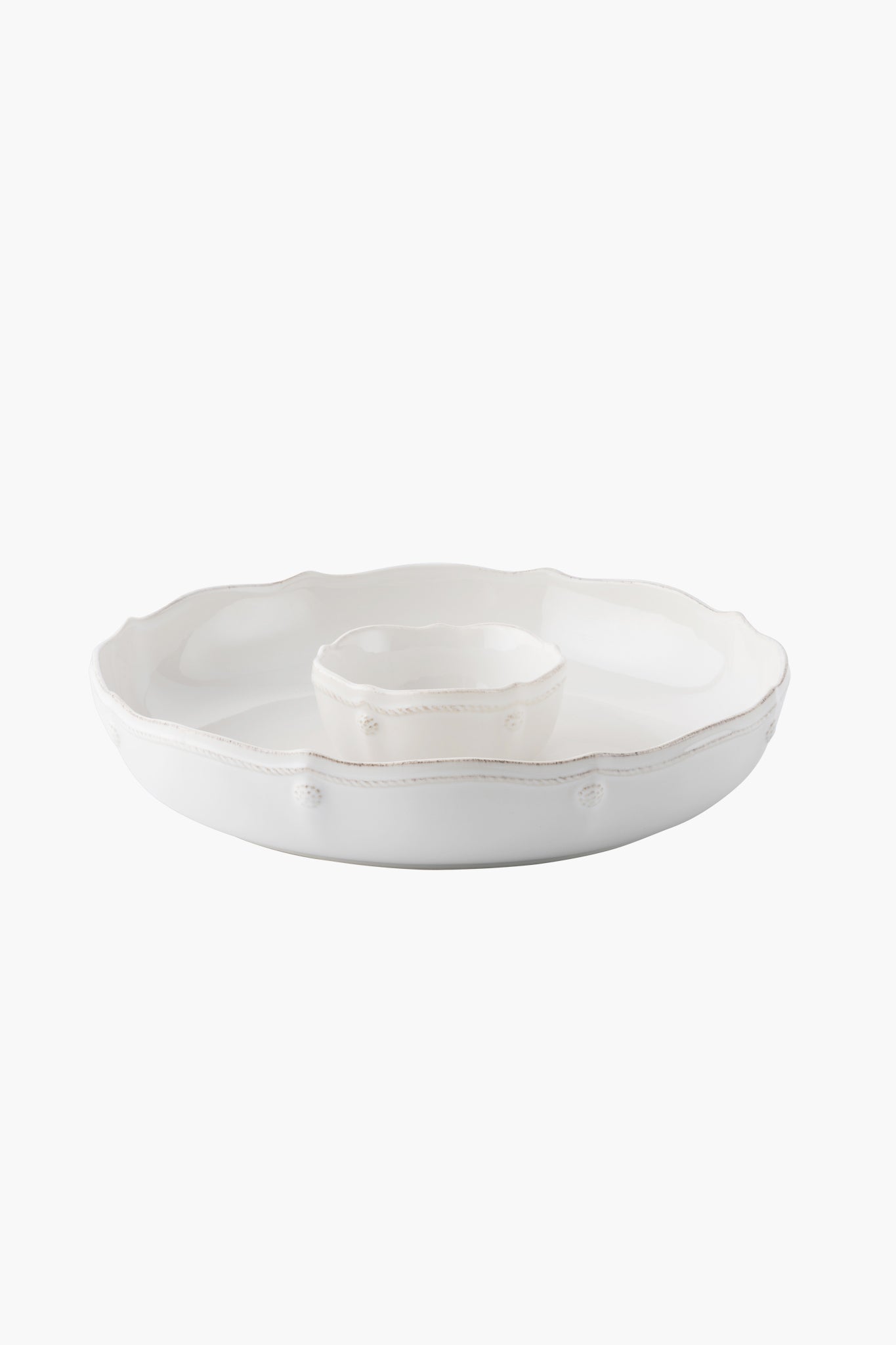 The Juliska white ceramic stoneware serving platter features a scalloped edge and central bowl inspired by the Berry & Thread design—ideal as a chip n dip bowl for serving dips or sauces.