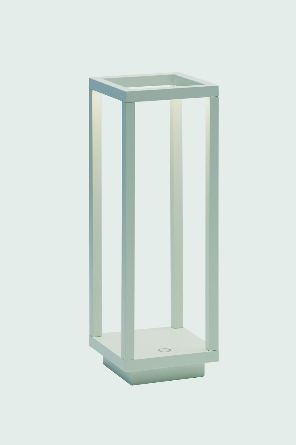 A modern, minimalist rectangular table lamp by Zafferano, featuring an open frame design, soft white light, Italian styling, and cordless rechargeable convenience.