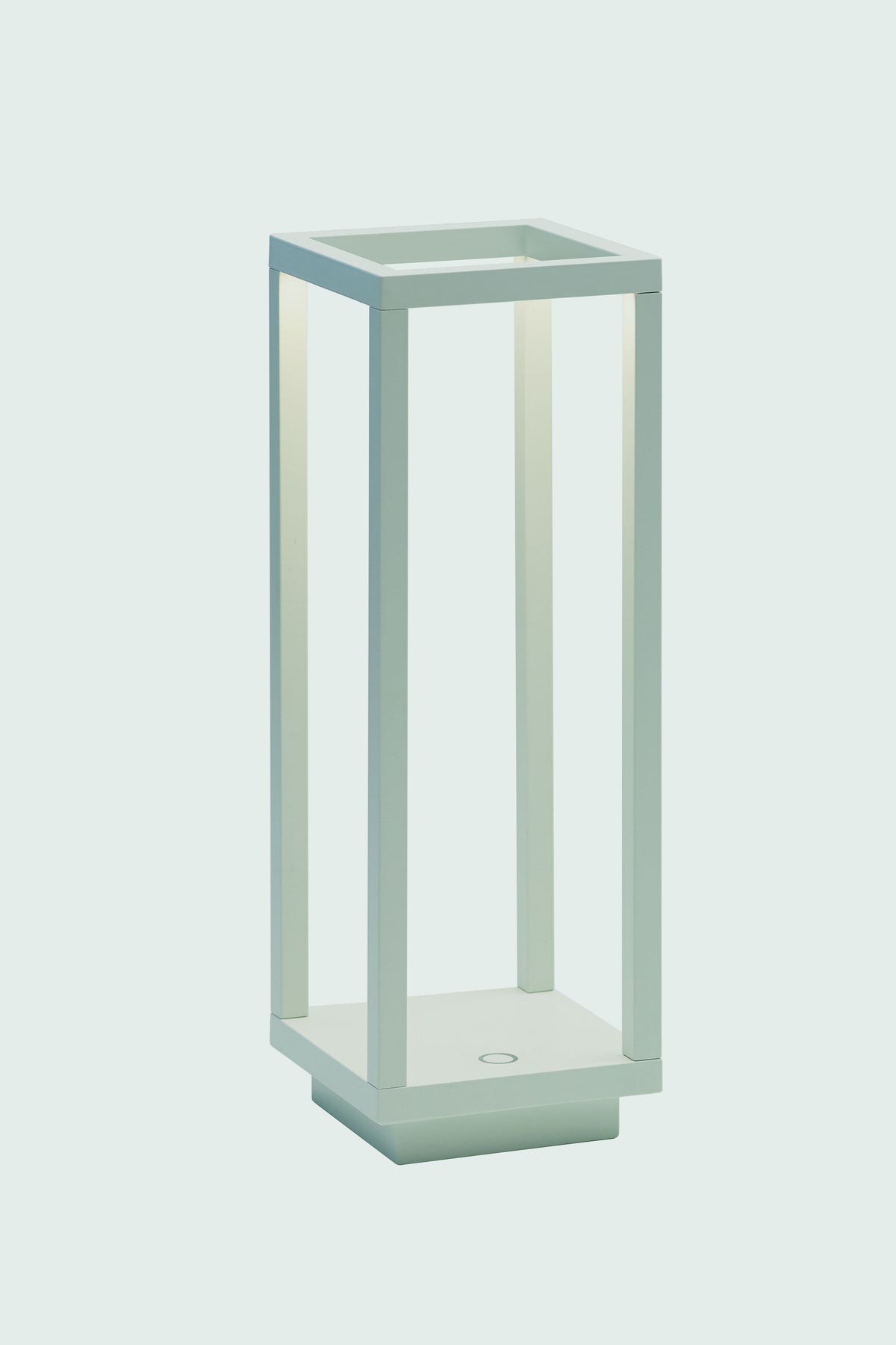 A modern, minimalist rectangular table lamp by Zafferano, featuring an open frame design, soft white light, Italian styling, and cordless rechargeable convenience.