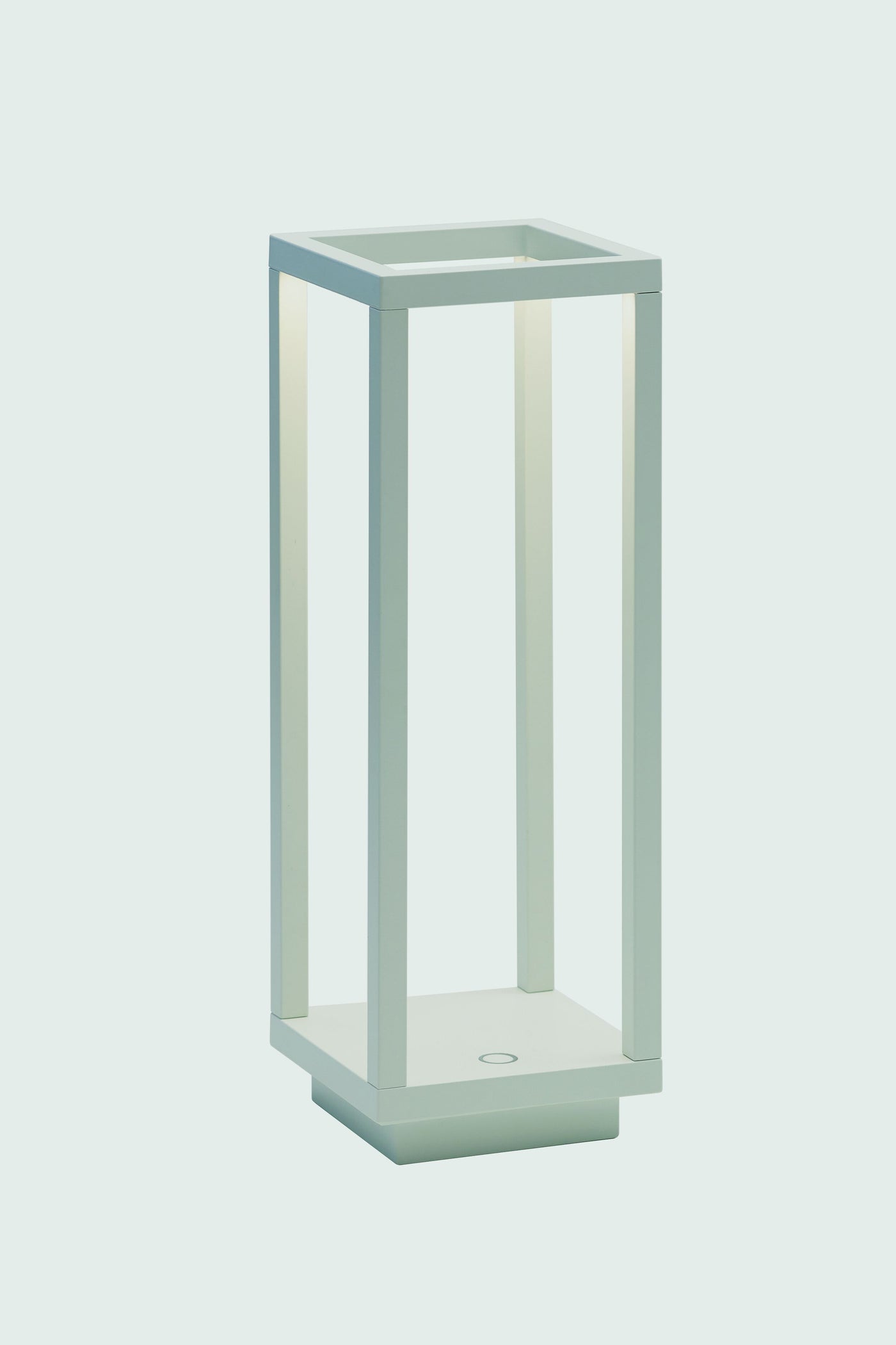 A modern, minimalist rectangular table lamp by Zafferano, featuring an open frame design, soft white light, Italian styling, and cordless rechargeable convenience.