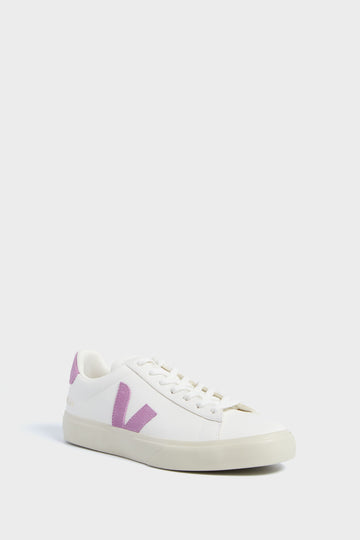 This stylish and eco-friendly VEJA sneaker features white leather, purple accents, a purple V logo on the side, and white laces.