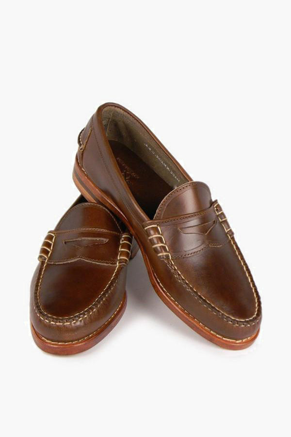 A pair of Rancourt brown Horween Chromexcel leather loafers with light stitching and a slight heel, shown with one shoe overlapping the other.