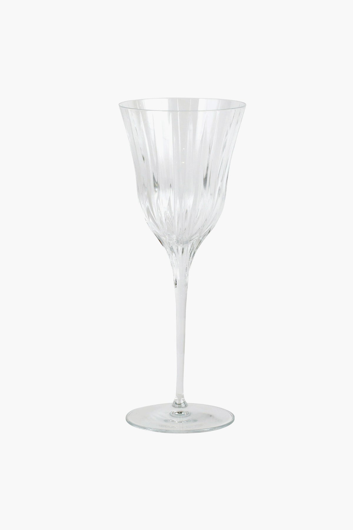 Clear, empty Vietri Natalia Wine Glass featuring a fluted bowl, long stem, and round base. Exquisitely handmade in Italy.