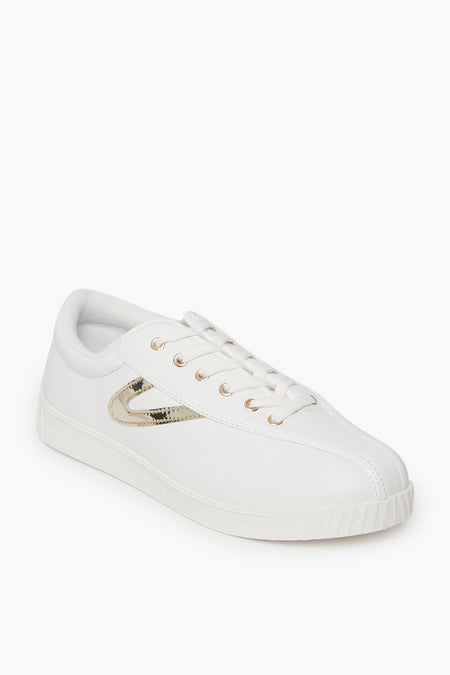 White Tretorn Nylite Canvas Sneaker featuring gold metallic accents and white laces, shown from the front.