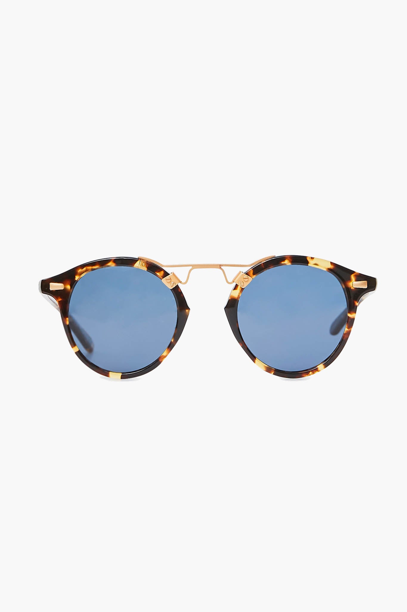 KREWE du optic round sunglasses feature blue polarized lenses, tortoiseshell frames, and slim gold metal details. Handcrafted for style and comfort, they provide 100% UV protection.