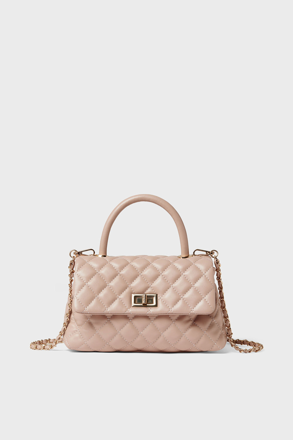 A close-up of the Urban Expressions quilted crossbody bag, an elegant animal-friendly handbag crafted from vegan leather.