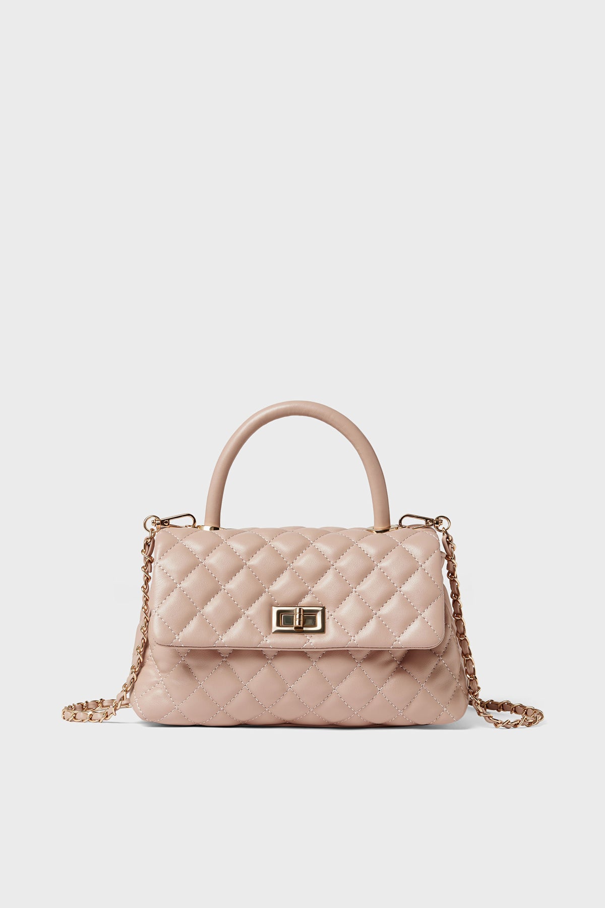 A close-up of the Urban Expressions quilted crossbody bag, an elegant animal-friendly handbag crafted from vegan leather.