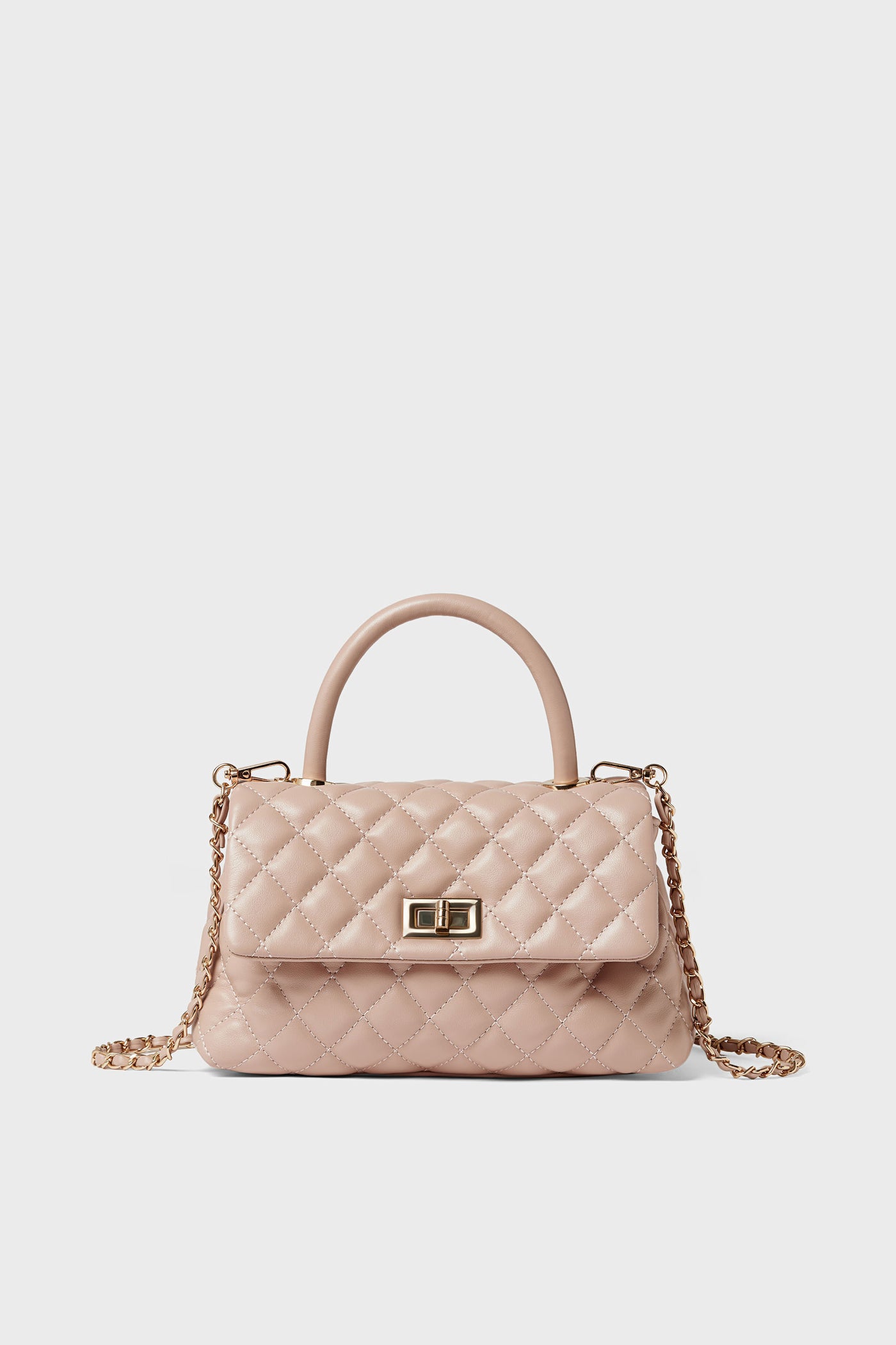 A close-up of the Urban Expressions quilted crossbody bag, an elegant animal-friendly handbag crafted from vegan leather.